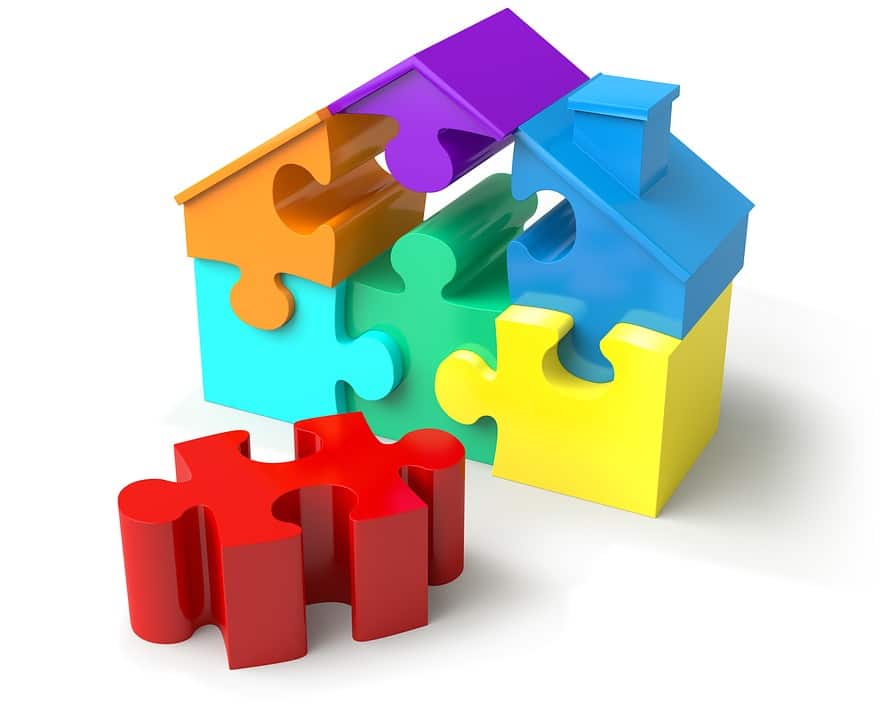 Maison stylisée en pièces de Puzzle colorées